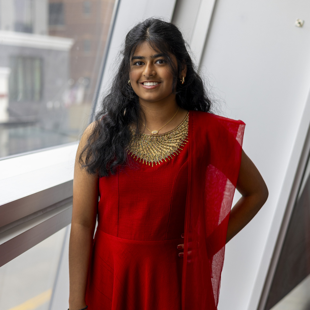 Greeshma smiling at camera