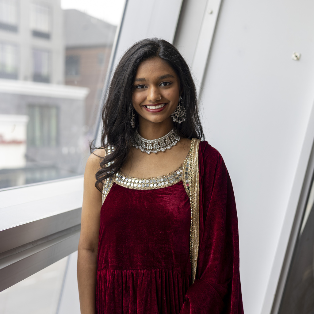 Kashish smiling at camera