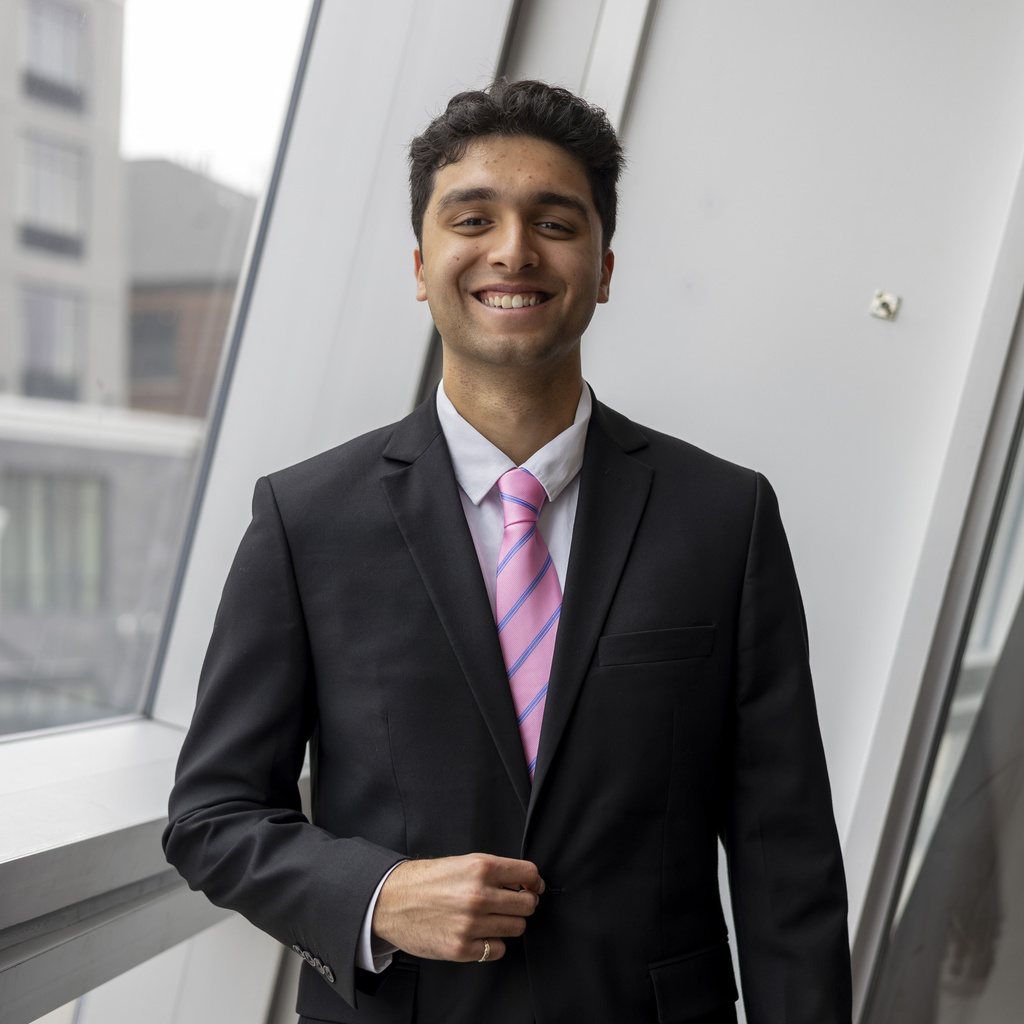 Sarthak Hood smiling at camera