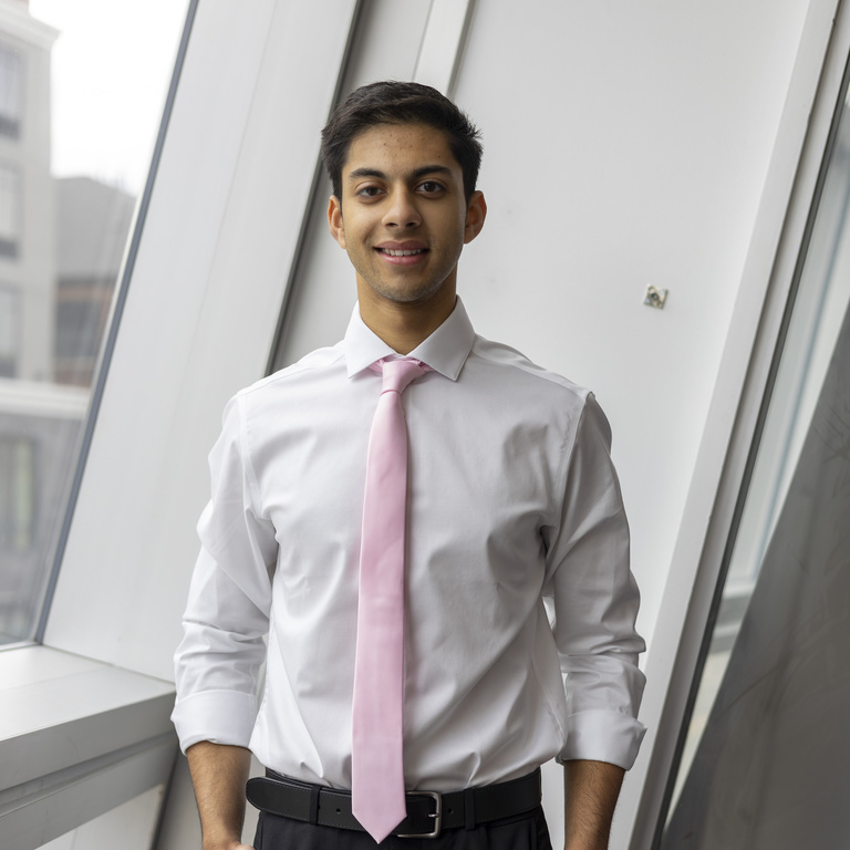 Akash Pradeep smiling at the camera
