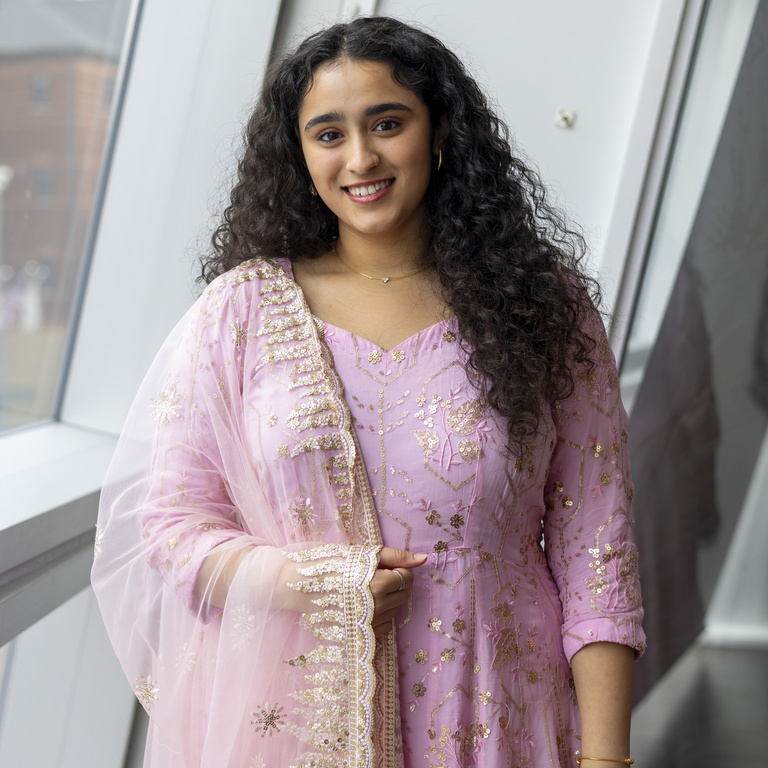 Jasmine Kaur smiling at the camera